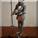 D104. Spanish knight statue. 9.5”h - $30 